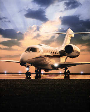 of a Cessna business plane sitting on the runway